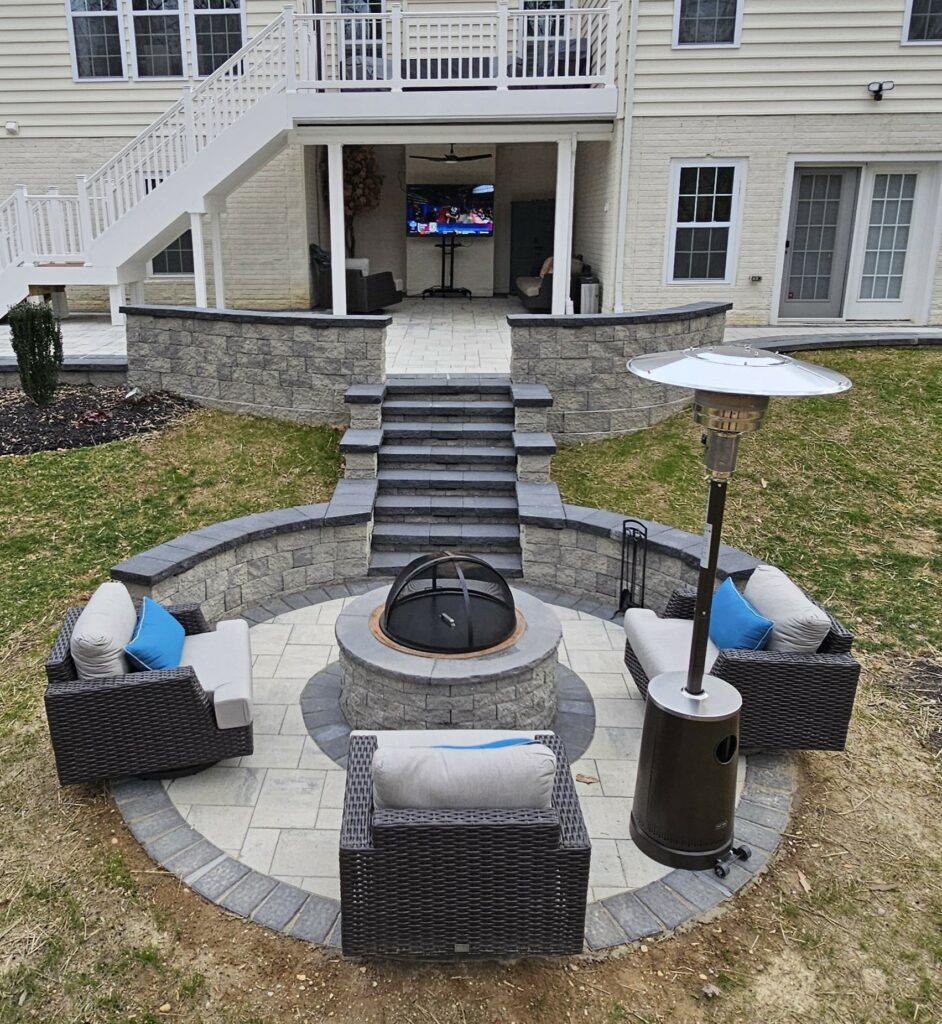 KP Contracting - Outdoor Living Area with Hardscaping and Custom Fireplace